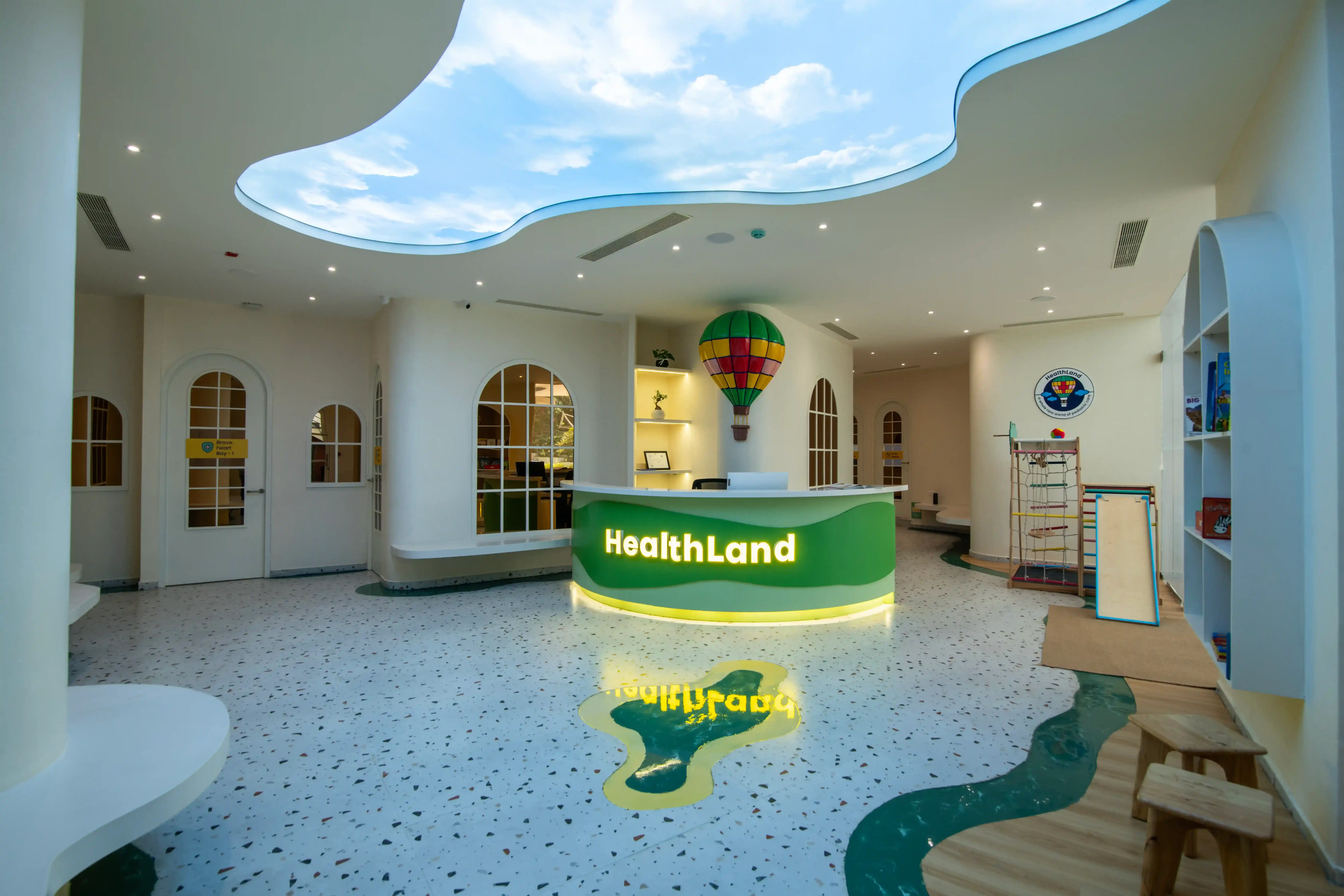 Pediatrician consulting with a child at HealthLand clinic in Whitefield